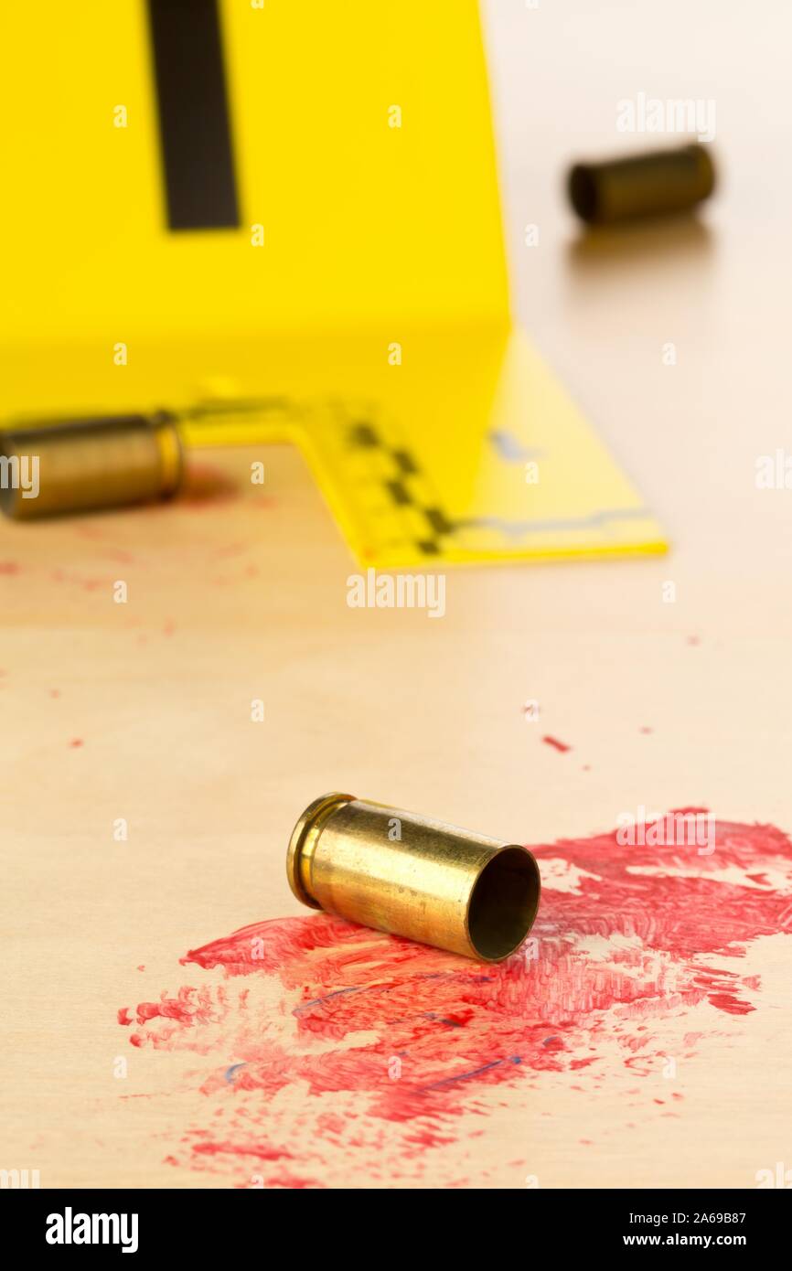 Crime scene investigation CSI evidence marker with empty, fired 9mm ...