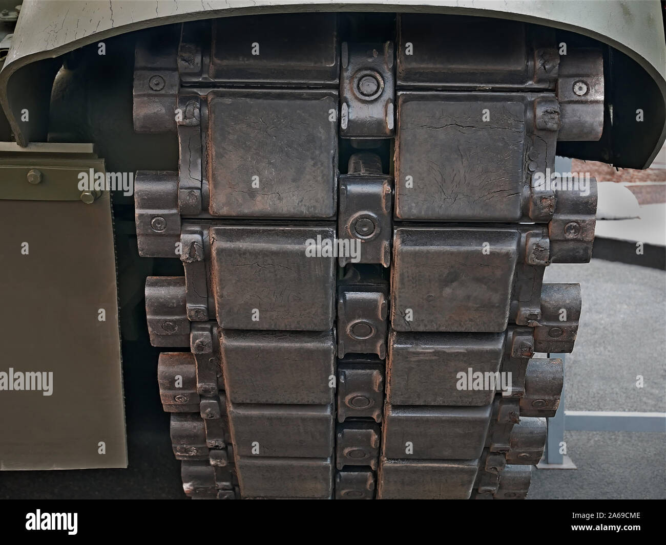 Military equipment; undercarriage of tank caterpillar tracked wheel; close-up Stock Photo