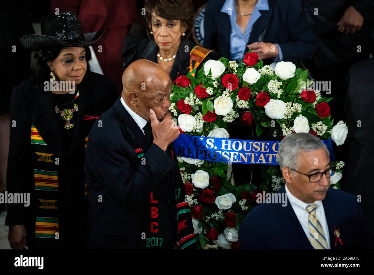 Washington DC, USA. 24th Oct 2019. United States Representative Maxine Waters (Democrat of California), top, US Representative Frederica Wilson (Democrat of Florida), left, US Representative John Lewis (Democrat of Georgia), and US Representative Robert Scott (Democrat of Virginia), lower right, walk past the casket of late US Representative Elijah Cummings (Democrat of Maryland) during a memorial service in National Statuary Hall at the U.S. Capitol in Washington, DC, U.S., on Thursday, Oct. 24, 2019. Credit: dpa picture alliance/Alamy Live News Stock Photo