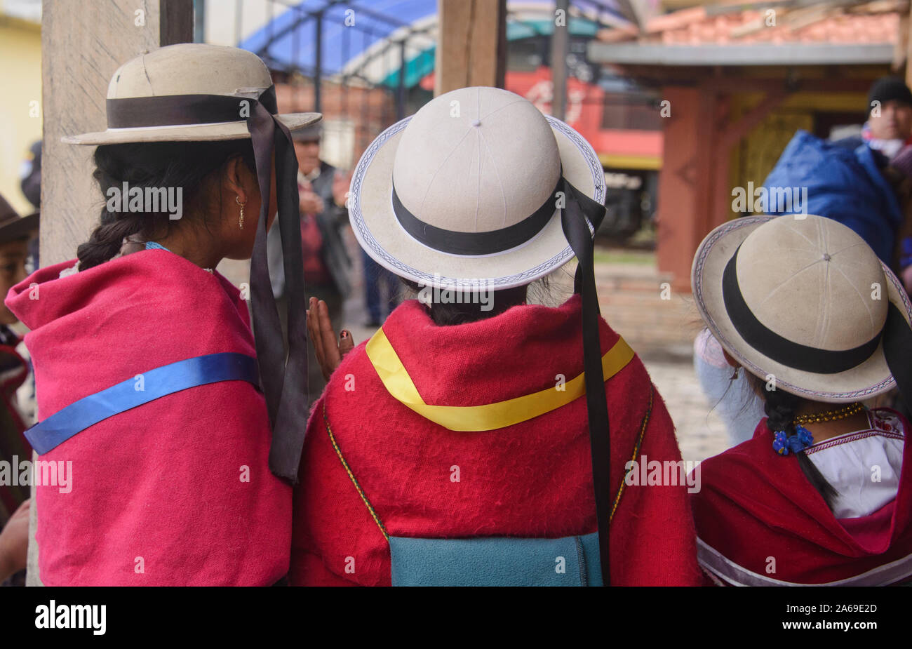 Indigenous girls with hats, La Moya, Ecuador Stock Photo