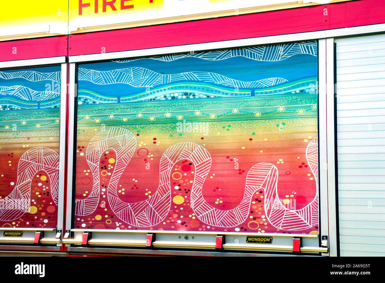 Australian Aboriginal Art work by local Kamilaroi first nation members on the side of a Mercedes Fire Brigade engine. Stock Photo