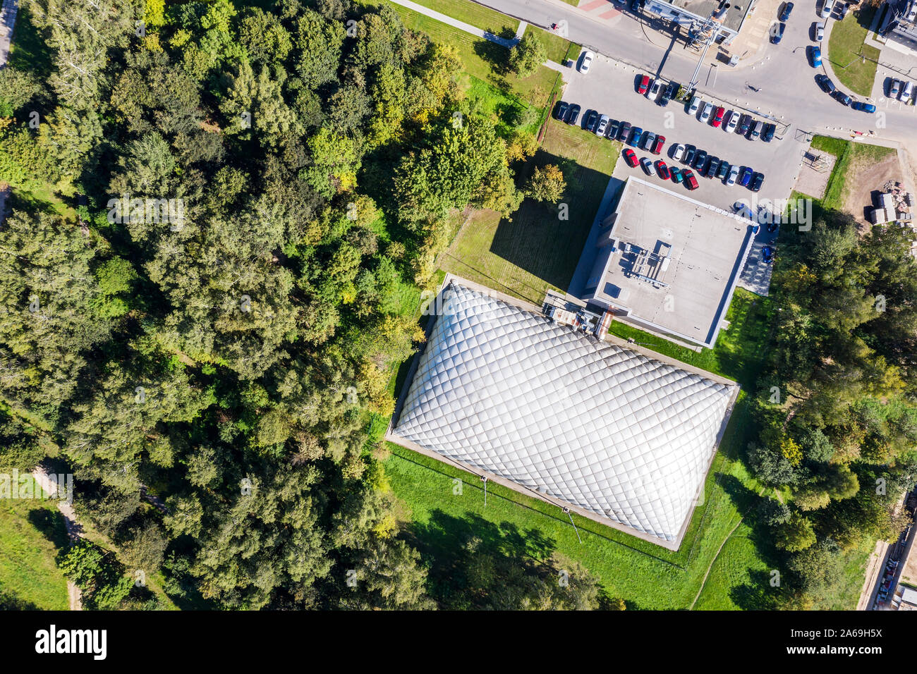 aerial top view of sports inflatable hall at suburb area Stock Photo