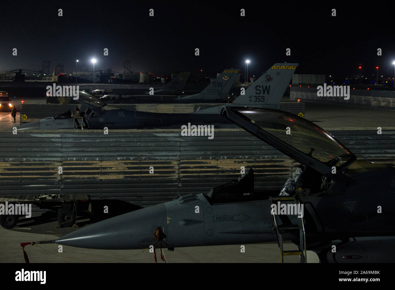 U.S. Air Force F-16 Fighting Falcons from the 79th Fighter Squadron at Shaw Air Force Base, S.C., arrive at Bagram Airfield, Afghanistan, Oct. 25, 2019. While assigned to the 455th Air Expeditionary Wing at Bagram, the F-16s will help provide decisive airpower through the U.S. Central Command area of responsibility. The airpower the wing provides ensures NATO forces can focus on their mission to train, advise and assist. (U.S. Air Force photo by Staff Sgt. Matthew Lotz) Stock Photo