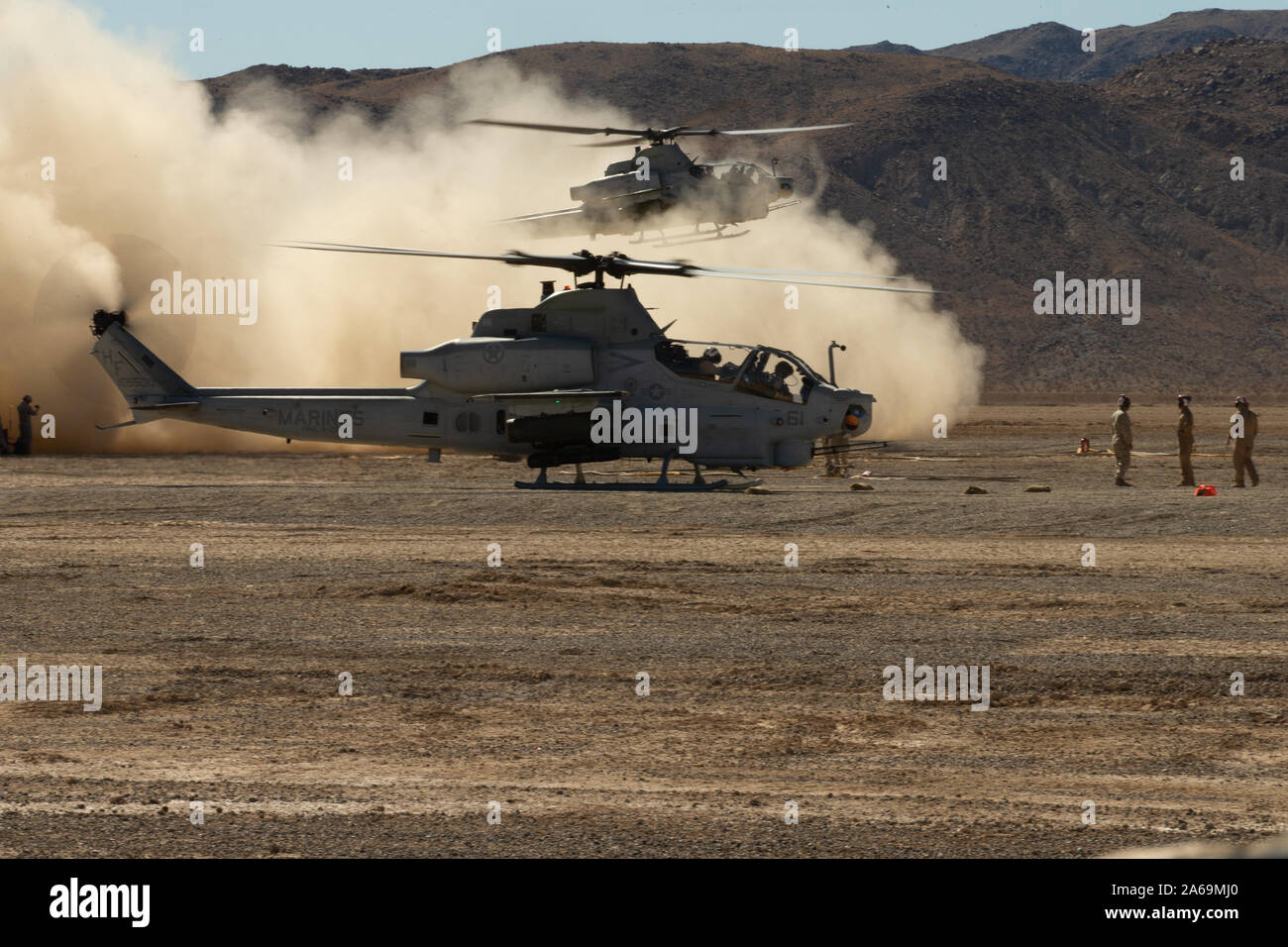 U.S. Marine Corps AH-1Z Viper helicopters with the Marine Light Attack Helicopter Squadron (HMLA) 269, 2nd Marine Aircraft Wing land during a training event at Marine Corps Air Ground Combat Center, Twentynine Palms, California, Oct. 23, 2019. The training simulated an effective approach on conducting a logistical restock in a combat zone. HMLA-269 will be supporting the 2nd Marine Division (2d MARDIV) in the execution of the MAGTF Warfighting Exercise (MWX) 1-20. MWX is set to be the largest exercise conducted by the 2d MARDIV in several decades. (U.S. Marine Corps photo by Pfc. Patrick King) Stock Photo