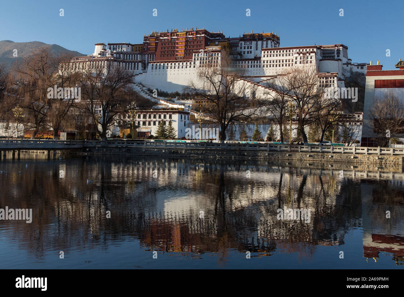 The Potala Palace at first light on a winter morning in Lhasa, Tibet.  Formerly the winter palace of the Dali Lama.  A UNESCO World Heritage Site. Stock Photo