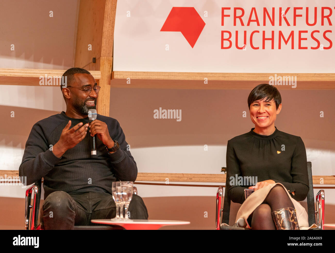FRANKFURT AM MAIN, Germany - October 17 2019: Khalid Albaih and Ine Marie Eriksen Søreide at 71st Frankfurt Book Fair / Buchmesse Frankfurt Stock Photo