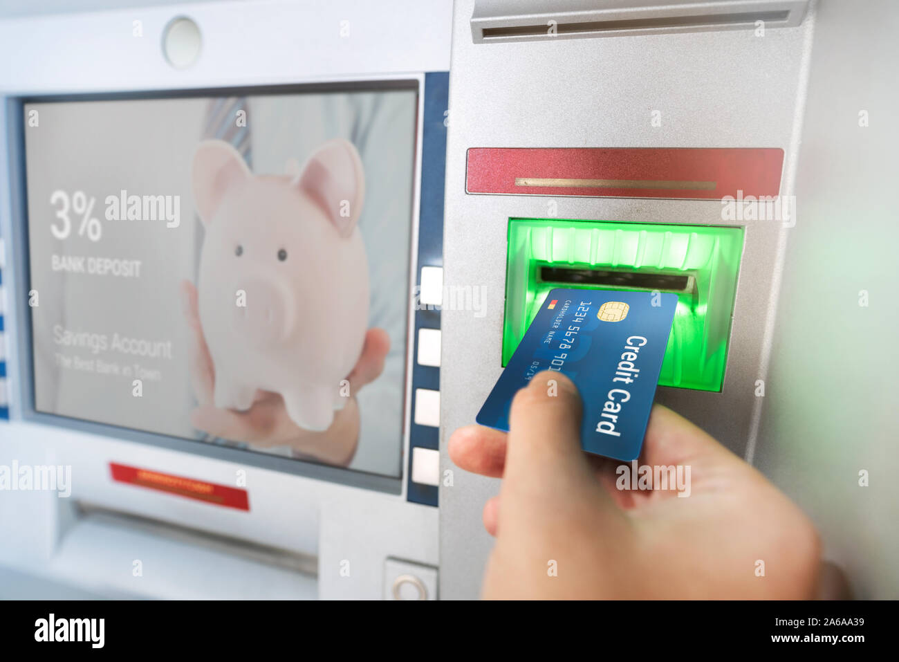 Withdraw money from an ATM using a credit card. ATM close up. Stock Photo