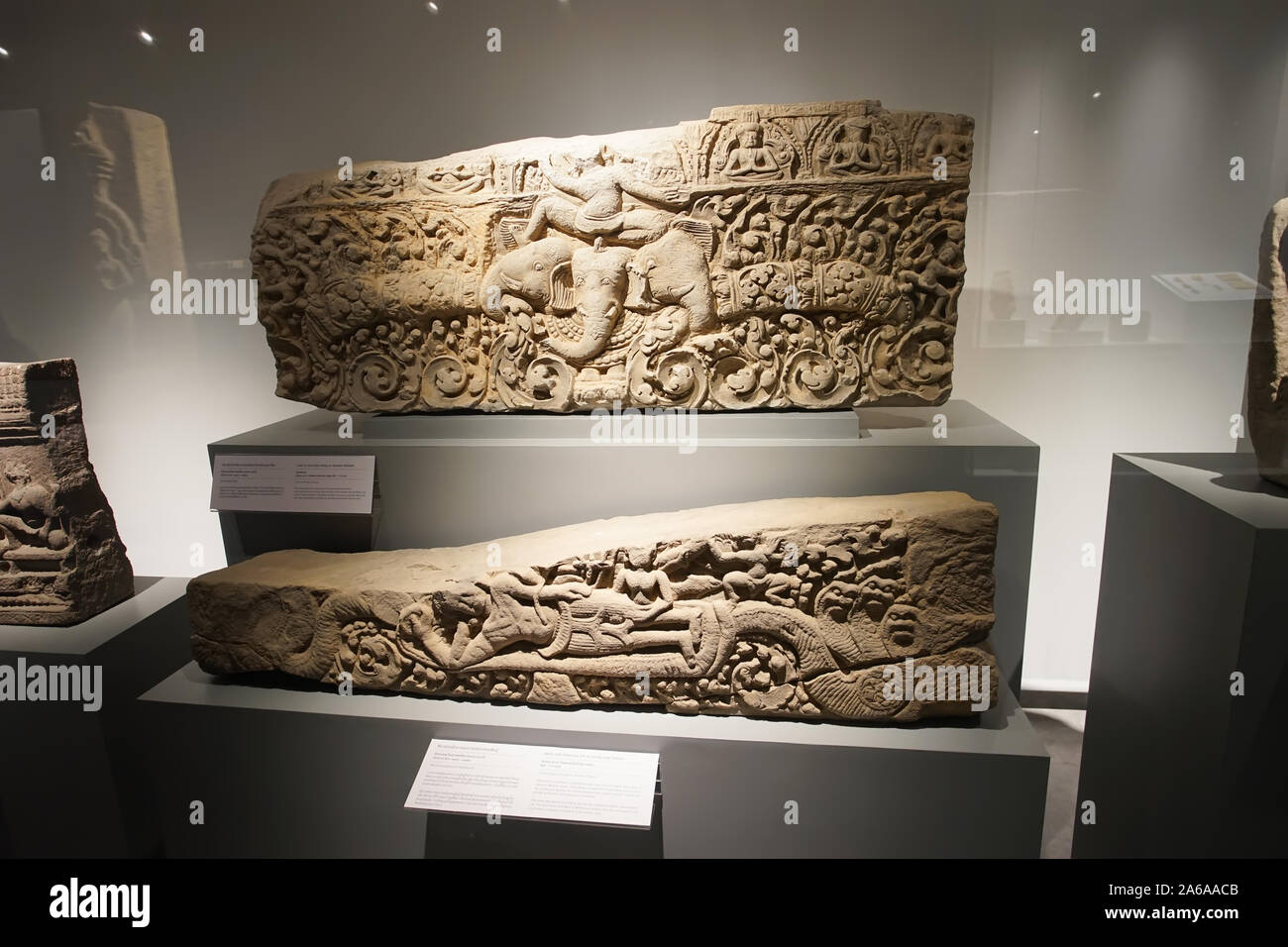 Prachin buri, Thailand - August 26, 2019: Lintel of Lord Indra and Stone slab depicting the reclining Lord Vishnu.(Koh Ker style) in Thailand 637-717 Stock Photo