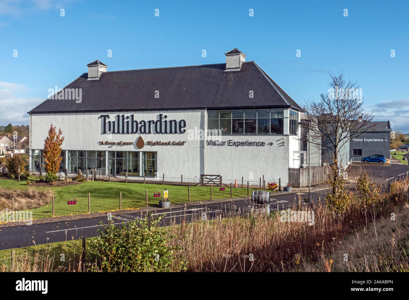 West facing view of Tullibardine distillery producing Scotch single malt whisky in Blackford Perth and Kinross Scotland UK beside A9 on right Stock Photo