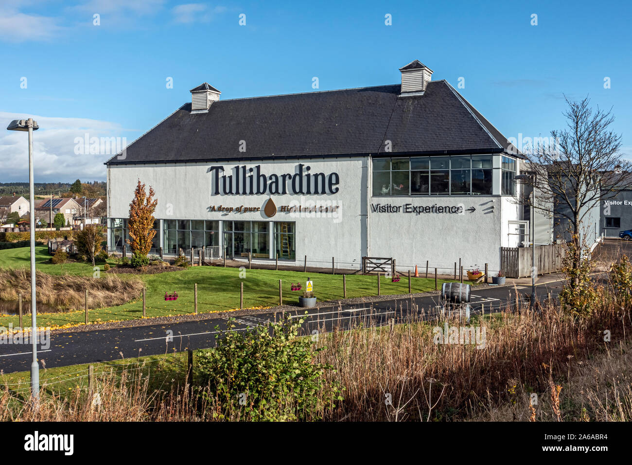 West facing view of Tullibardine distillery producing Scotch single malt whisky in Blackford Perth and Kinross Scotland UK beside A9 on right Stock Photo