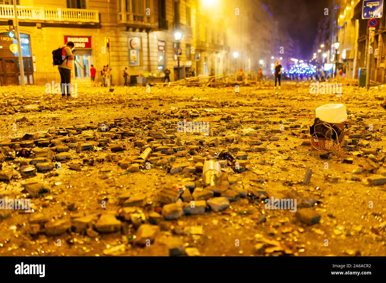 Barcelona, Spain - 16 october 2019: in the aftermath of a night of riots with catalan police the streets in urquinaona are left full of trash and ston Stock Photo