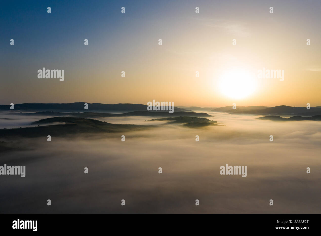Drone flight over misty hills hi-res stock photography and images - Alamy
