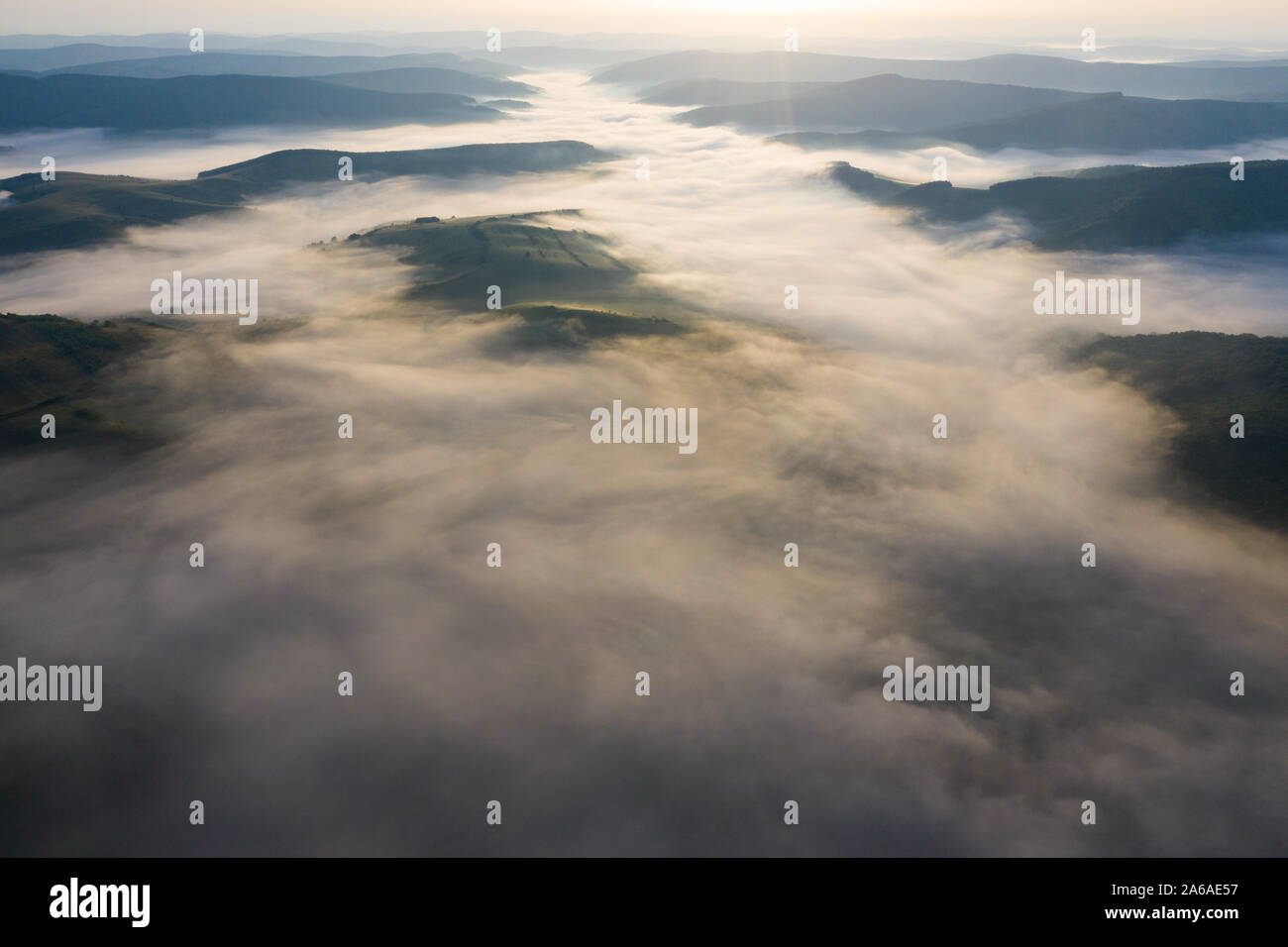 Drone flight over misty hills hi-res stock photography and images - Alamy