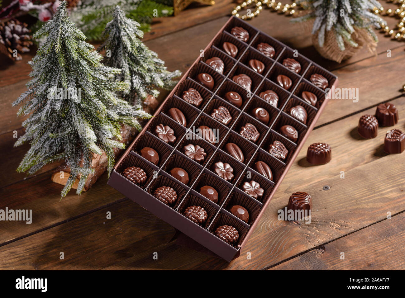 Assortment of fine chocolate candies, white, dark, and milk chocolate ...