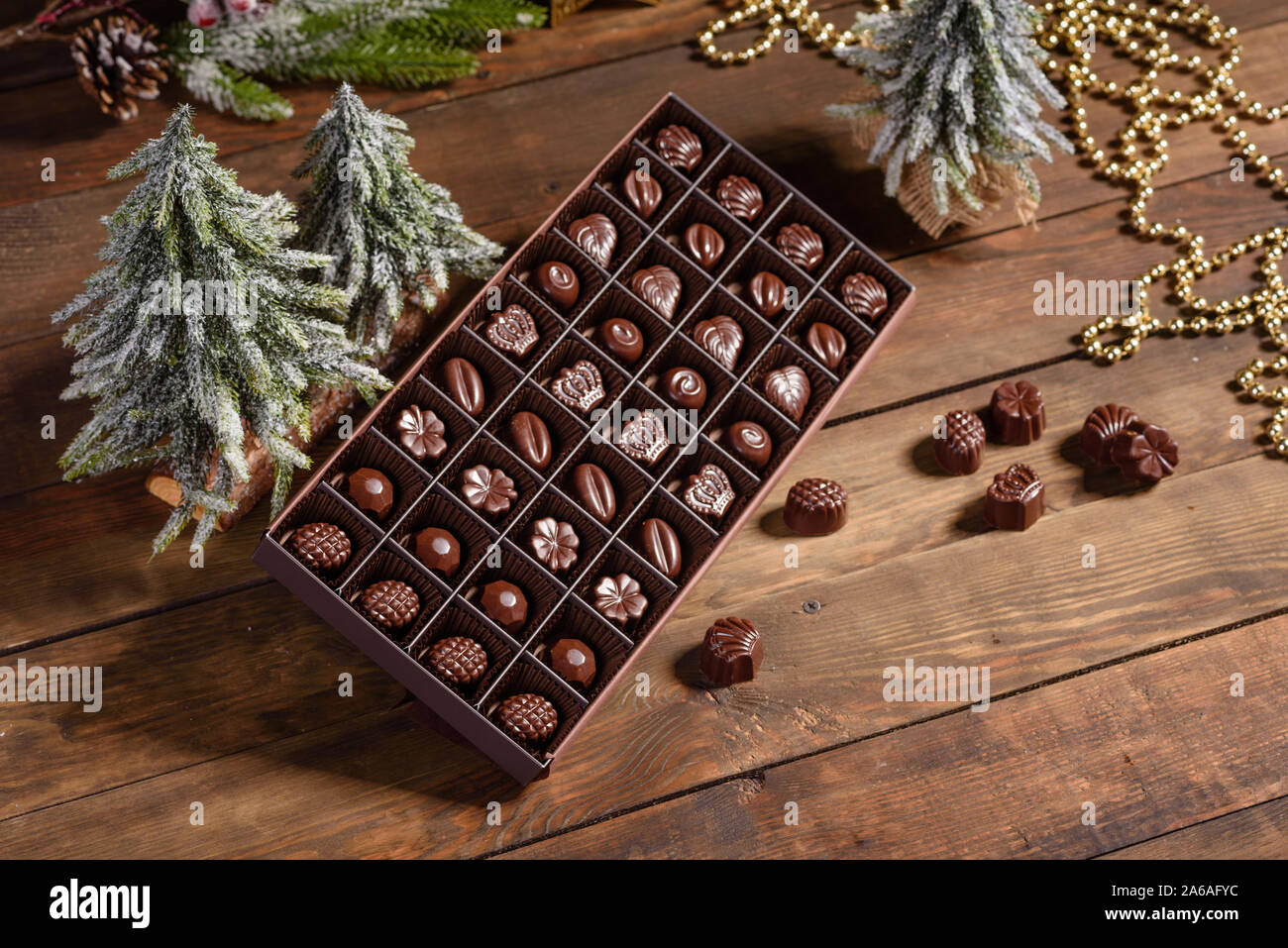 Assortment of fine chocolate candies, white, dark, and milk chocolate ...