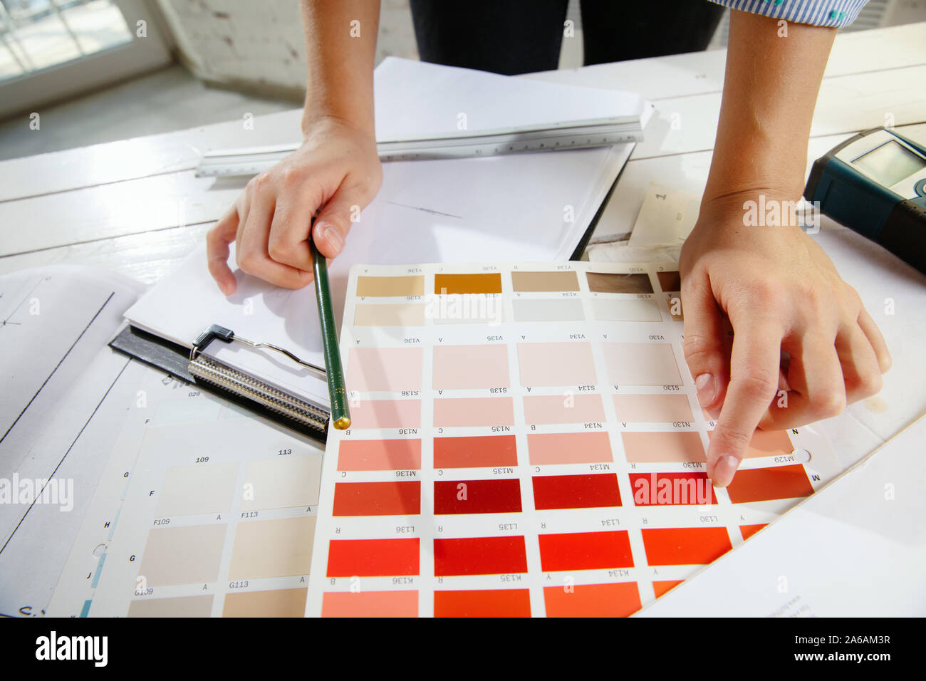 Professional interior designer or architector working with colour ...