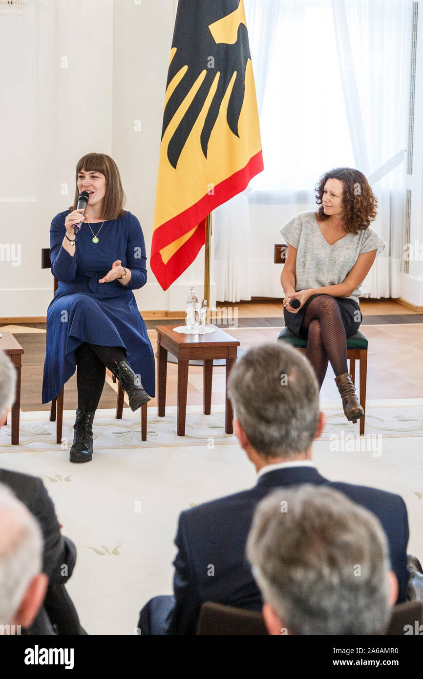 Berlin, Germany. 25th Oct, 2019. Stephanie Auras-Lehmann (l), founder of the welcome agency 'Comeback Elbe-Elster', and Jana Simon (r), writer, take part in another event of the Federal President's series of talks 'Geteilte Geschichte(n)' (Shared Stories) at Schloss Bellevue. Credit: Carsten Koall/dpa/Alamy Live News Stock Photo
