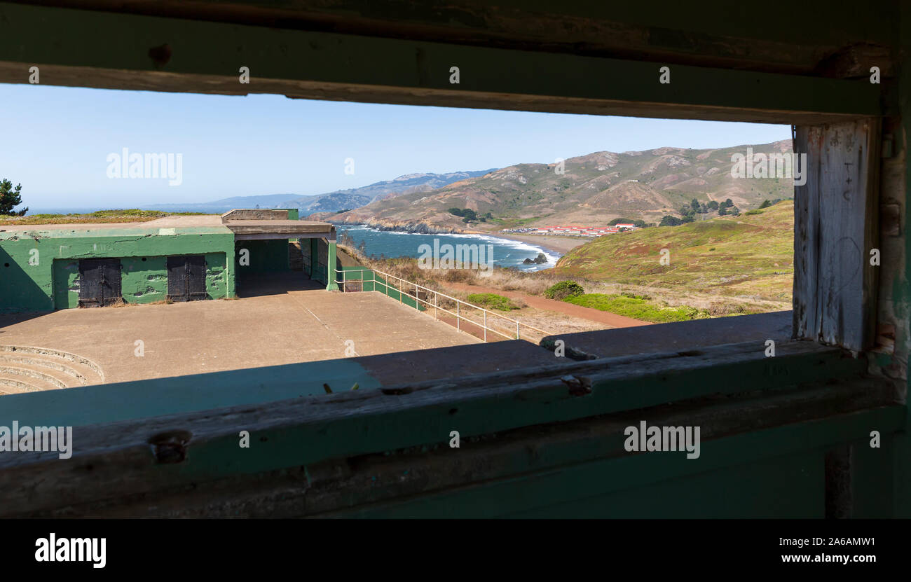 View through an old window in Battery Mendell of Rodeo Beach and the Marin Headlands in California, USA. Stock Photo