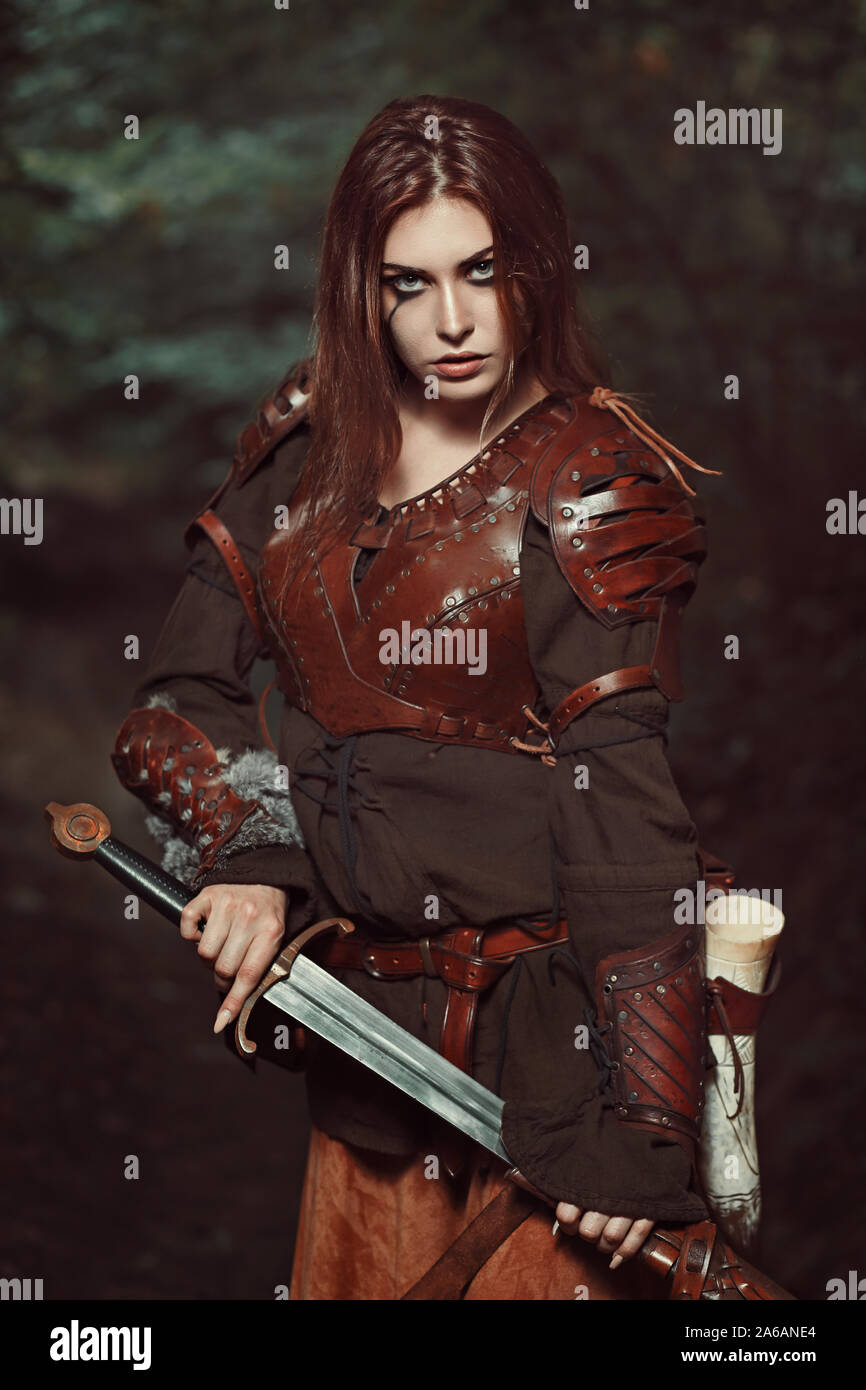 Beautiful female warrior with leather armor Stock Photo