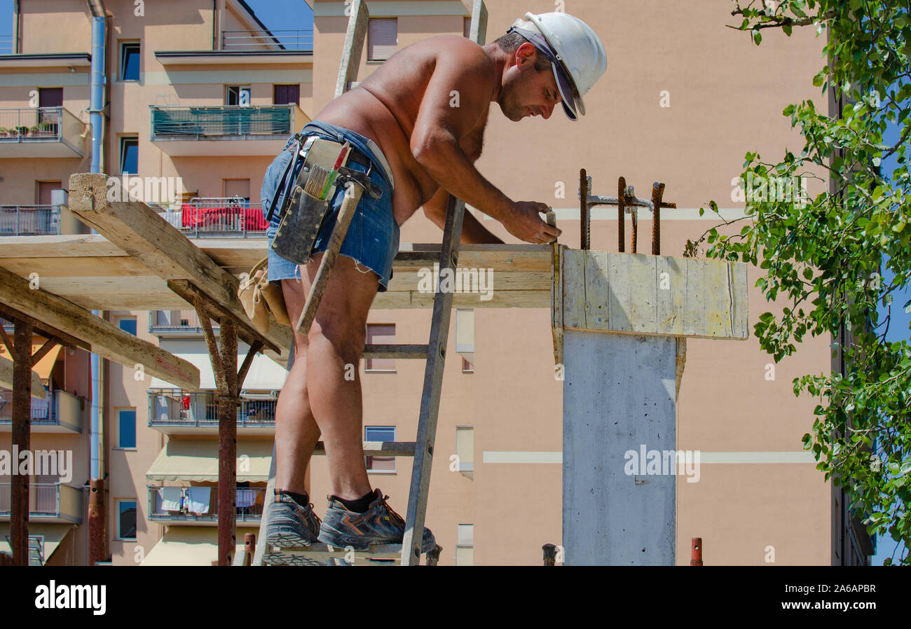 concrete work workers carpenters preparing construction formwork for