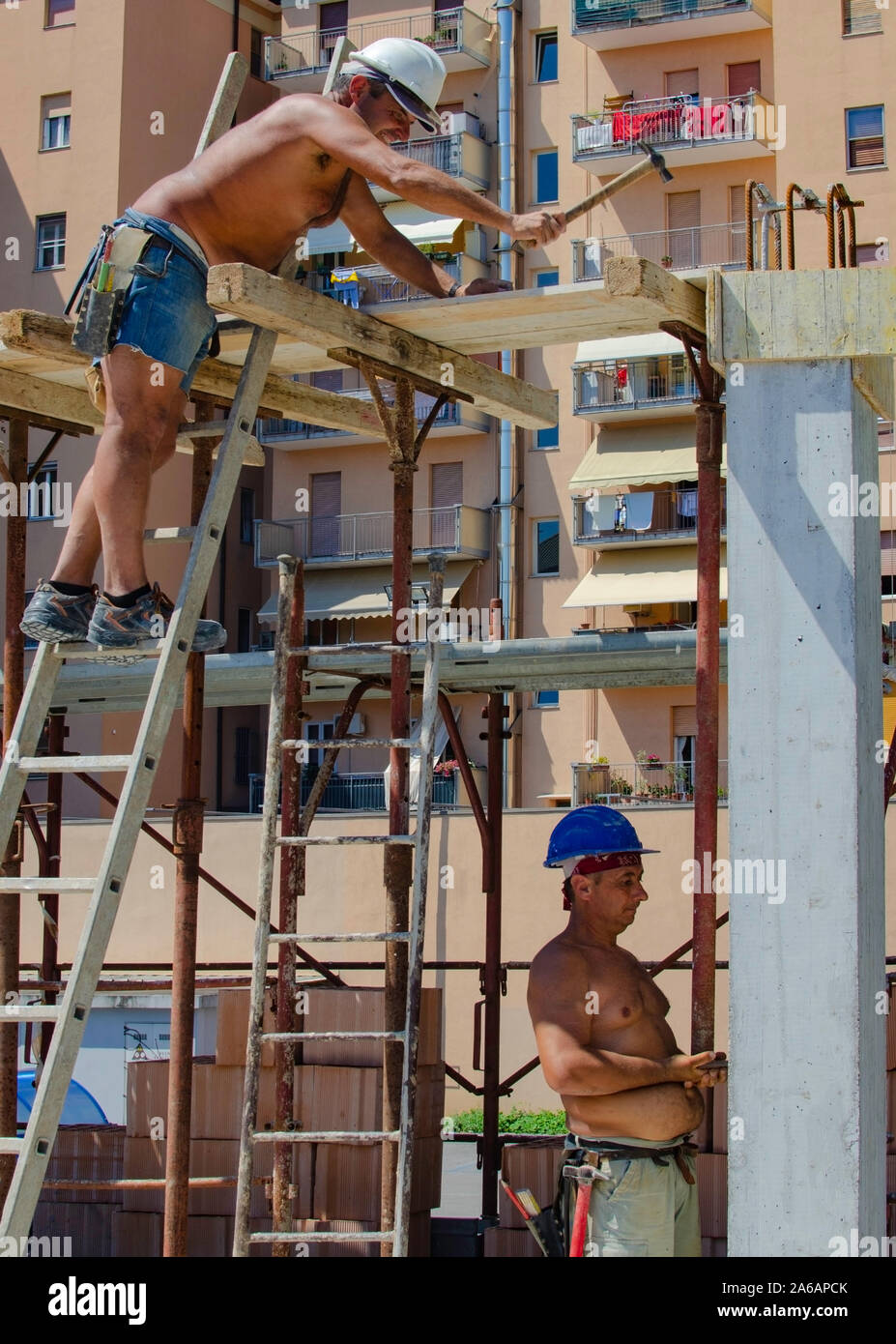 concrete work workers carpenters preparing construction formwork for