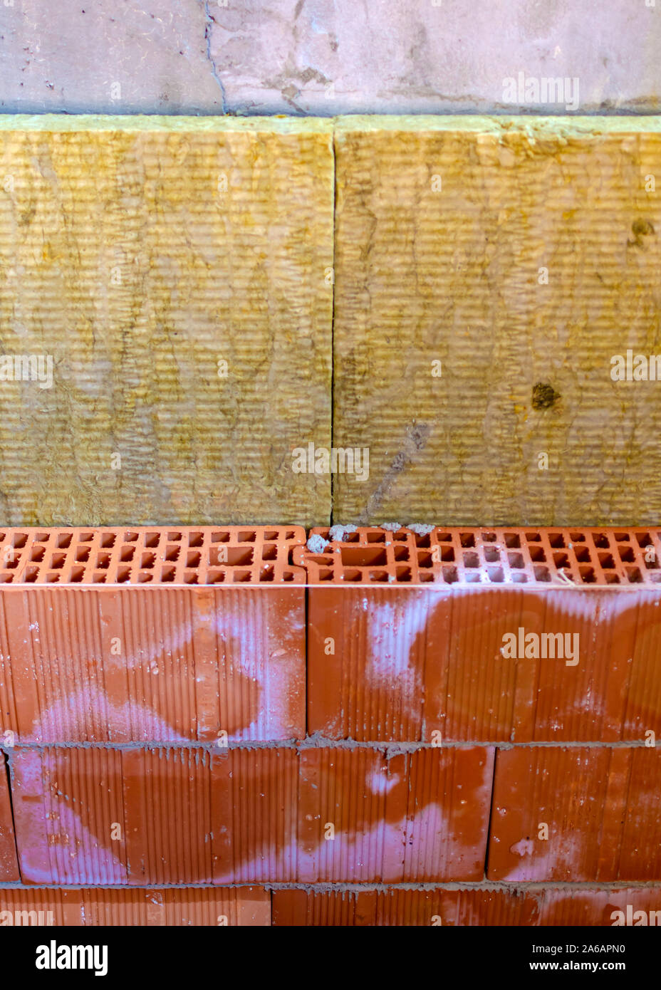 Construction of new brickwork with thermal brick blocks. In the cavity