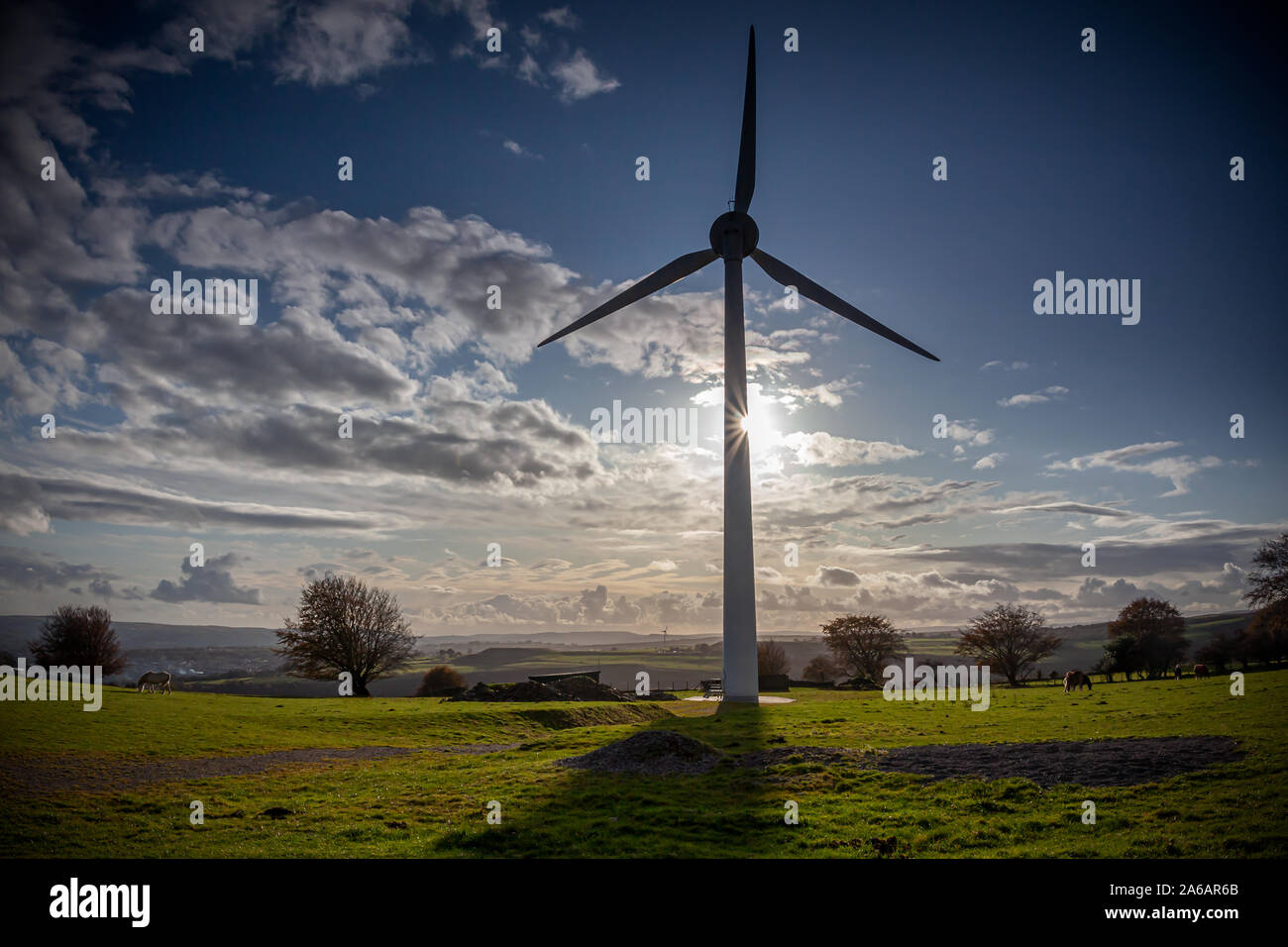 Wind turbine with dramatic evening light Stock Photo