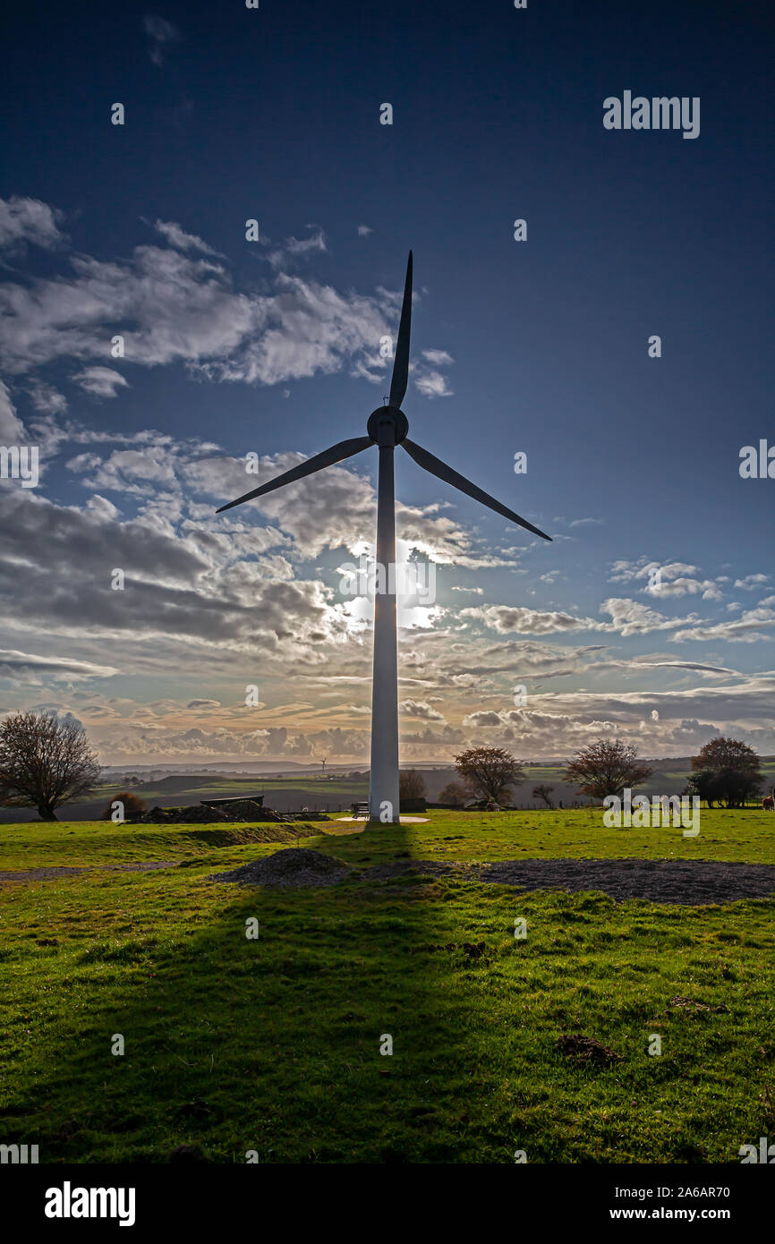 Wind turbine with dramatic evening light Stock Photo