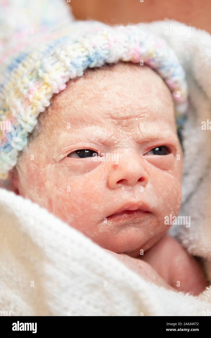 A young baby girl is born premature weighing just 4lbs, pictured here ...
