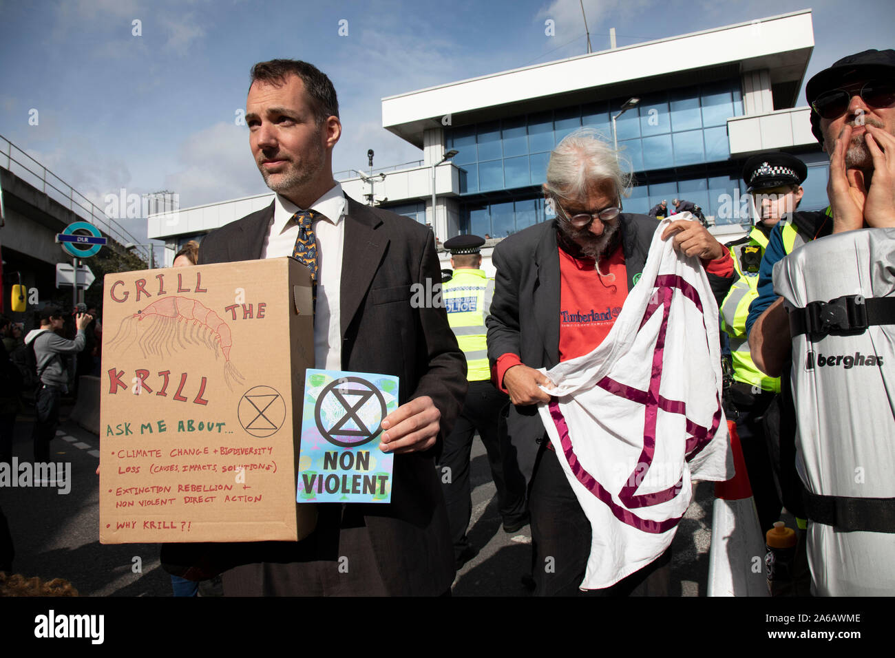 Extinction Rebellion disruption outside City Airport on 10th October 2019 in London, England, United Kingdom. The protest is against the climate and pollution impact of the government’s plans for airport expansion which will potentially double the amount of flights coming from City Airport. Extinction Rebellion is a climate change group started in 2018 and has gained a huge following of people committed to peaceful protests. These protests are highlighting that the government is not doing enough to avoid catastrophic climate change and to demand the government take radical action to save the p Stock Photo
