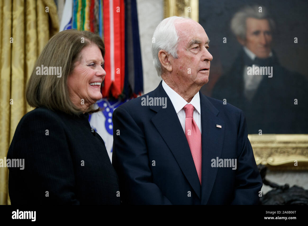 American racing magnate Roger Penske (R) and his wife Kathy Penske (L