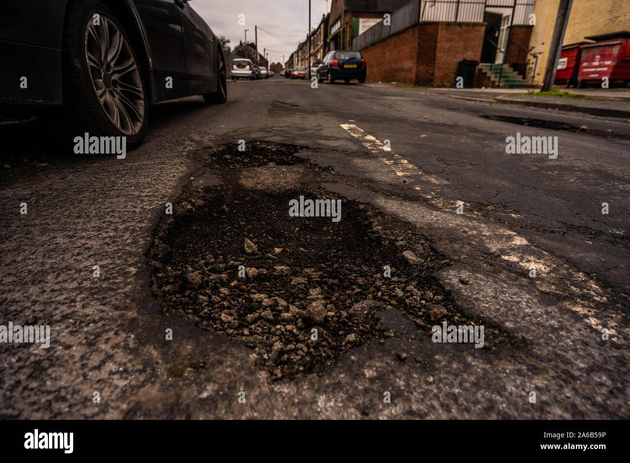 Gouges On Highway Damaged road surfaces, ridden with deep pot holes that cause damage to ...