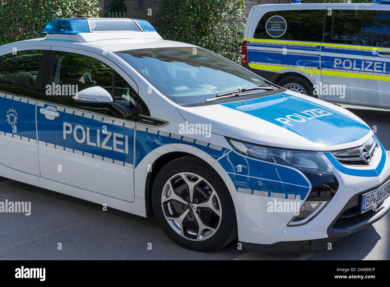 Ludwigsburg, Germany - 15 September 2019: German police car, patrol car, is standing in the street. Car brand Opel Ampera. Stock Photo