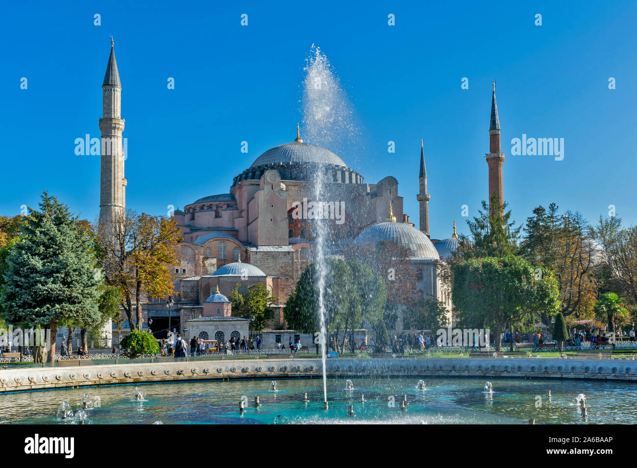 ISTANBUL TURKEY HAGIA SOPHIA DOME AND MINARETS WITH A FOUNTAIN AND SPRAY Stock Photo
