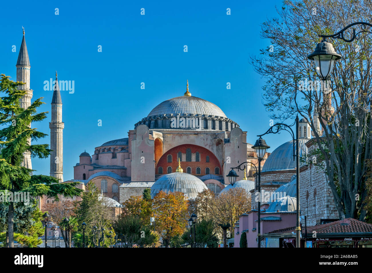 ISTANBUL TURKEY HAGIA SOPHIA DOME AND MINARETS WITH AUTUMNAL TREES AND LEAVES Stock Photo