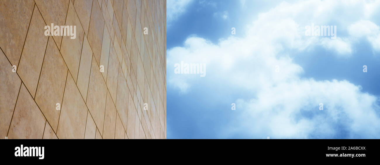 New modern ventilated stone wall made with different blocks of rectangular shape with wide joints against a sky background - image with copy space Stock Photo