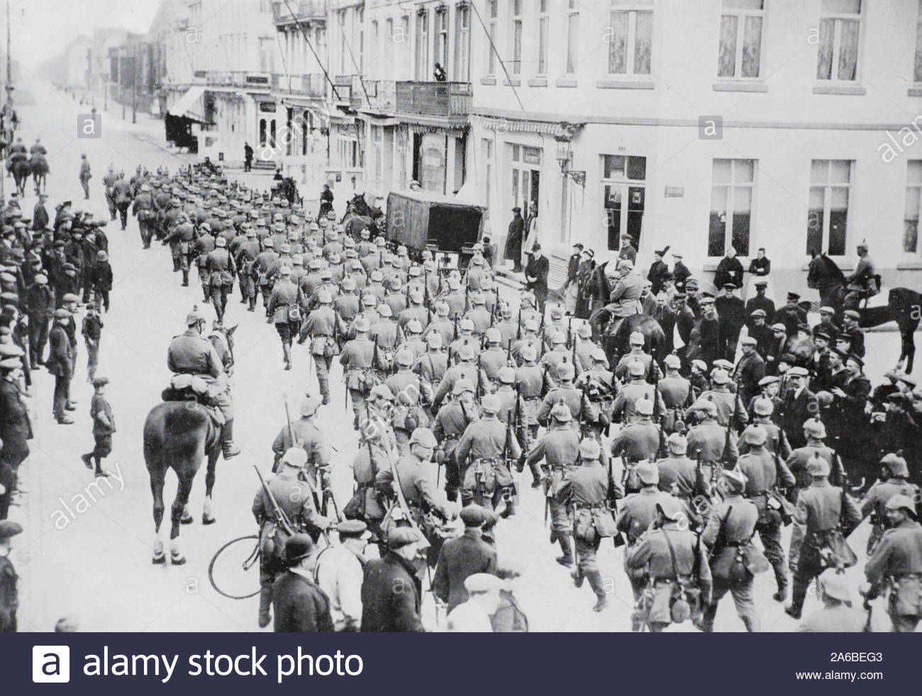 WW1 German Troops Marching through Blankenberge Belgium, vintage photograph from 1914 Stock Photo