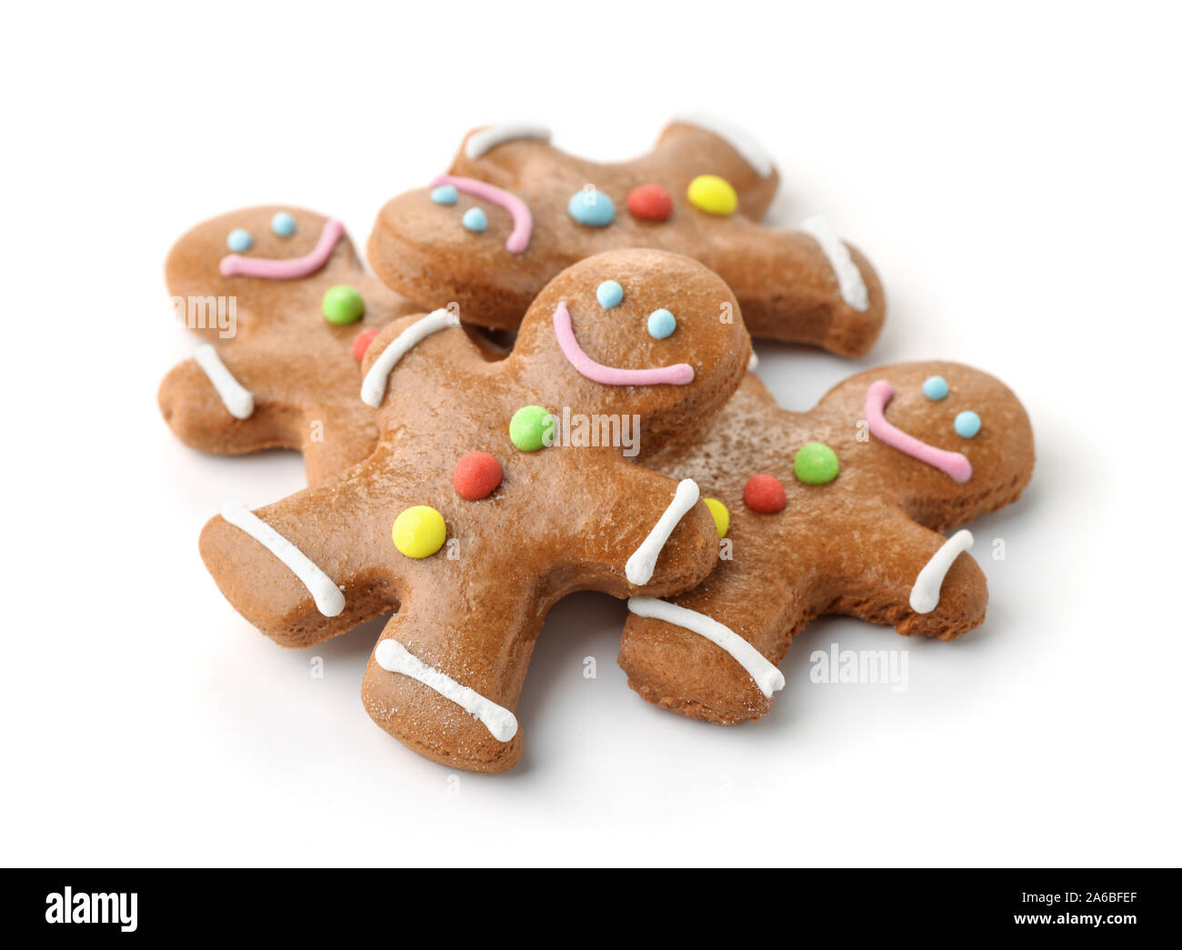 Pile of gingerbread men isolated on white Stock Photo