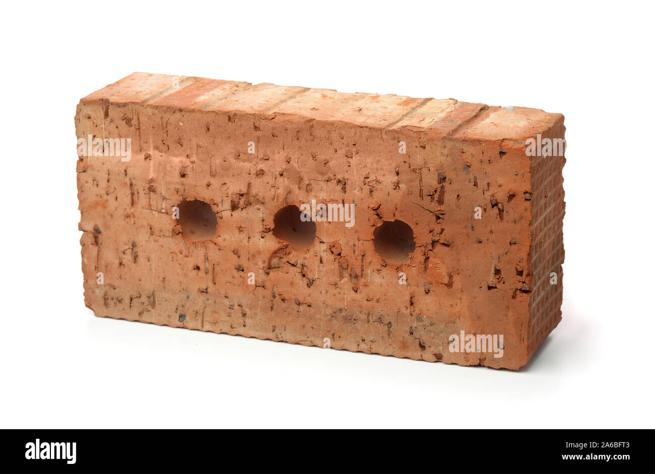 Single rough red clay  brick isolated on white Stock Photo