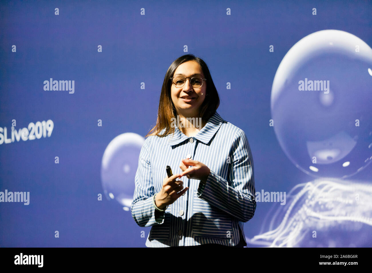 Roma Agrawal MBE,  Structural Engineer and Author, giving a talk entitled, 'How to build a skyscraper',  on the Engineering Stage, at New Scientist Live 2019. Stock Photo