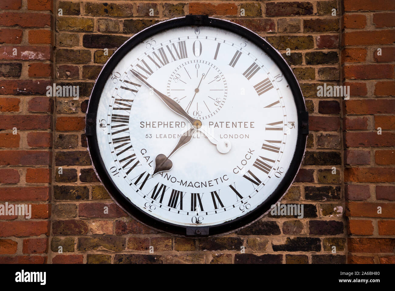 Twenty Four hour / 24 hour Greenwich Galvano-Magnetic clock ( by Shepherd ) on the wall of the Royal Observatory, Greenwich (ROG) London. UK (105) Stock Photo