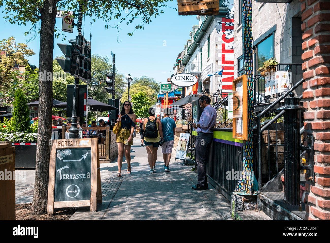 Saint Denis street, a very busy street whith restaurants and pubs. Montreal. Stock Photo