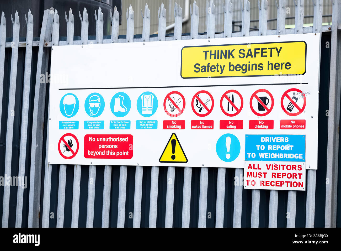 Think safety sign board at construction building site entrance Stock