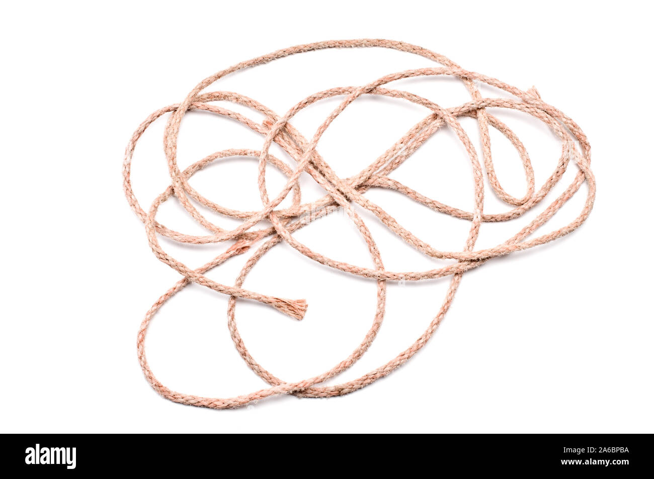Tangled rope on white background Stock Photo - Alamy