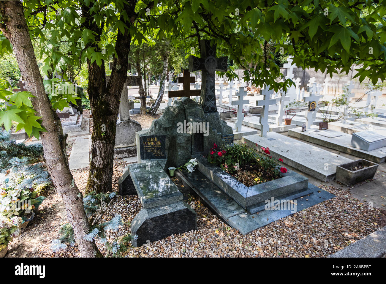 A grave tomb of the famous Russian film director, Andrei Tarkovsky, in the Sainte-Genevieve-des-Bois Russian Cemetery, France Stock Photo