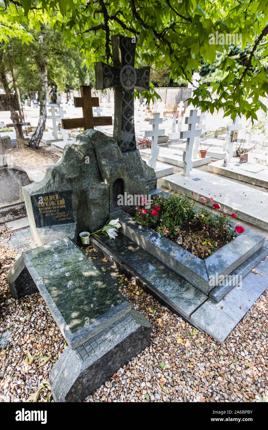 A grave tomb of the famous Russian film director, Andrei Tarkovsky, in the Sainte-Genevieve-des-Bois Russian Cemetery, France Stock Photo