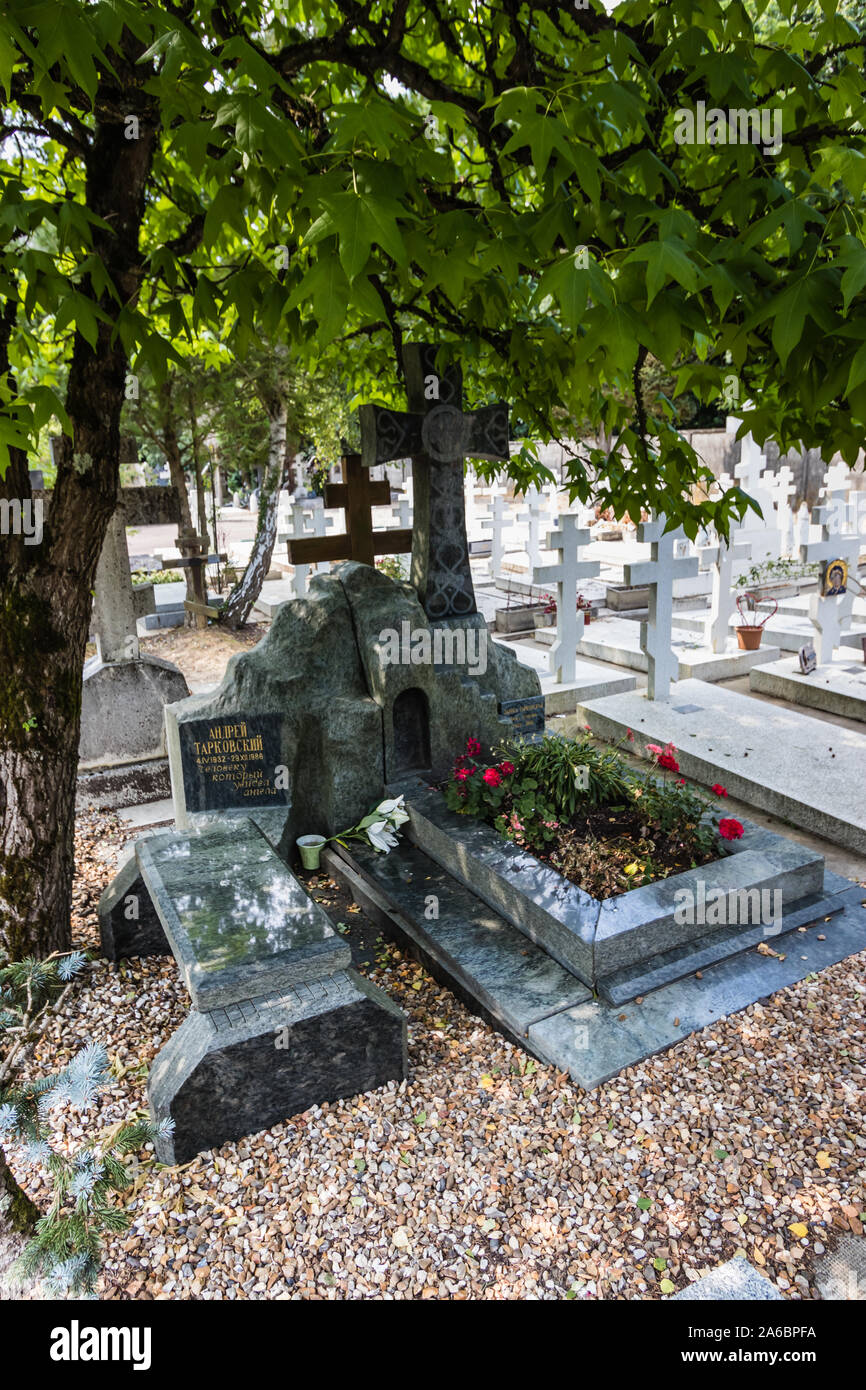 A grave tomb of the famous Russian film director, Andrei Tarkovsky, at the Sainte-Genevieve-des-Bois Russian Cemetery, France Stock Photo