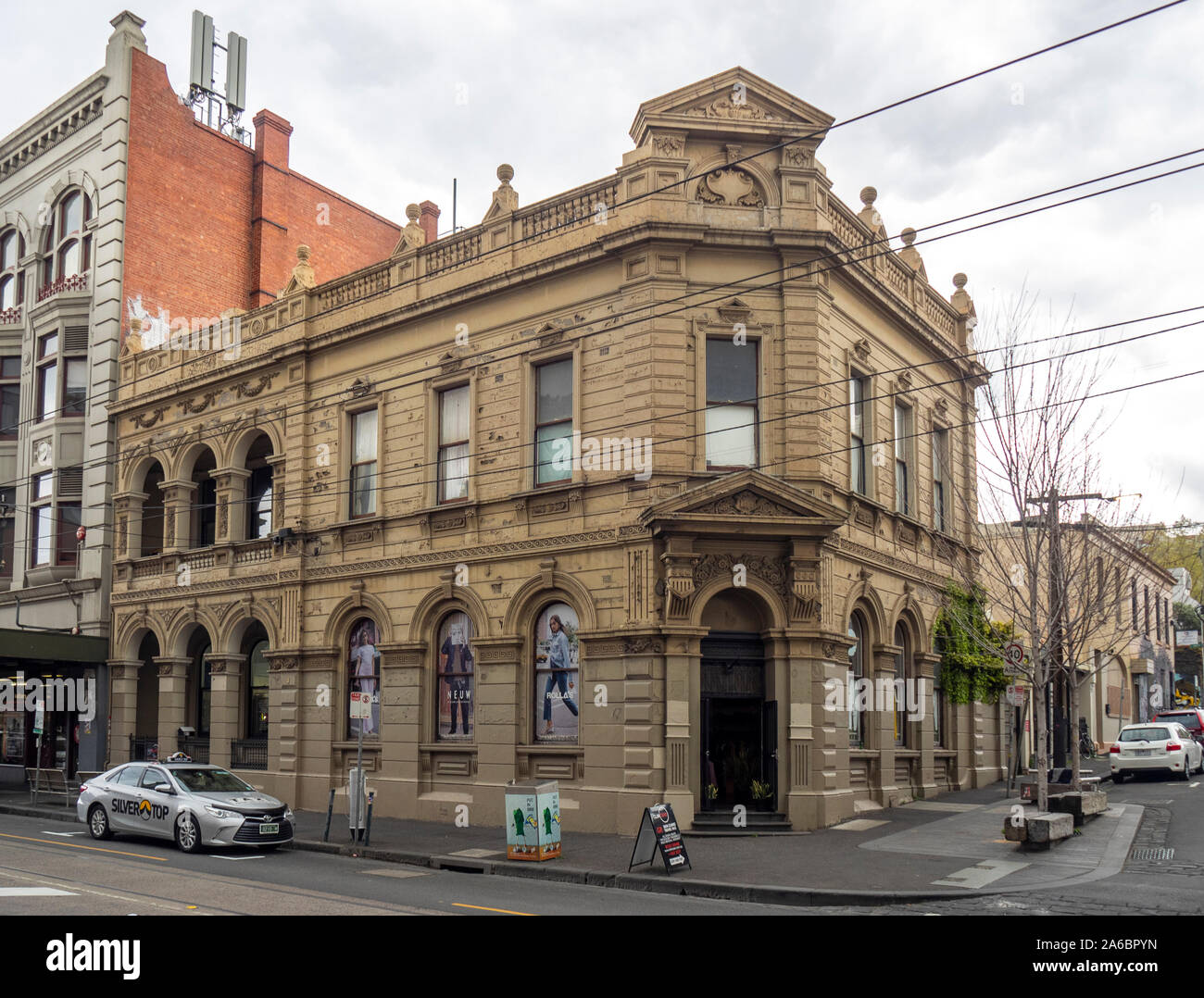 Silvertop taxi cab parked on Smith St Collingwood Melbourne Victoria Australia. Stock Photo