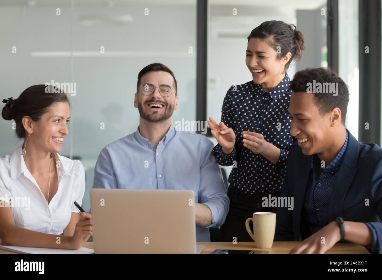Happy multiethnic workers team having fun during business meeting Stock Photo