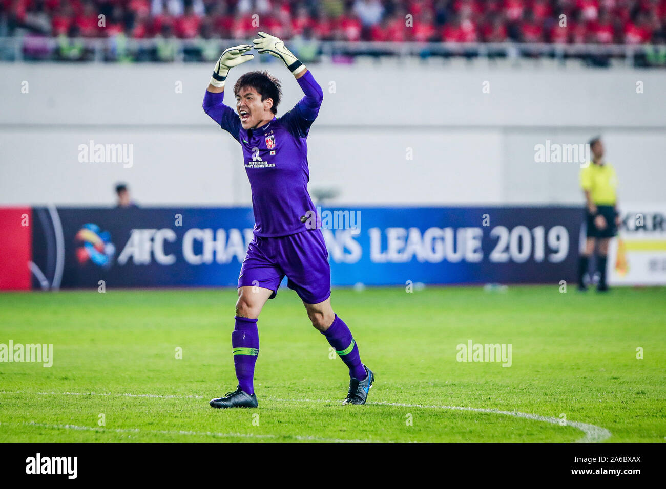 Goalkeeper Shusaku Nishikawa of Urawa Red Diamonds shouts at teammates during their second round match of the semi-final of the AFC Champions League 2 Stock Photo